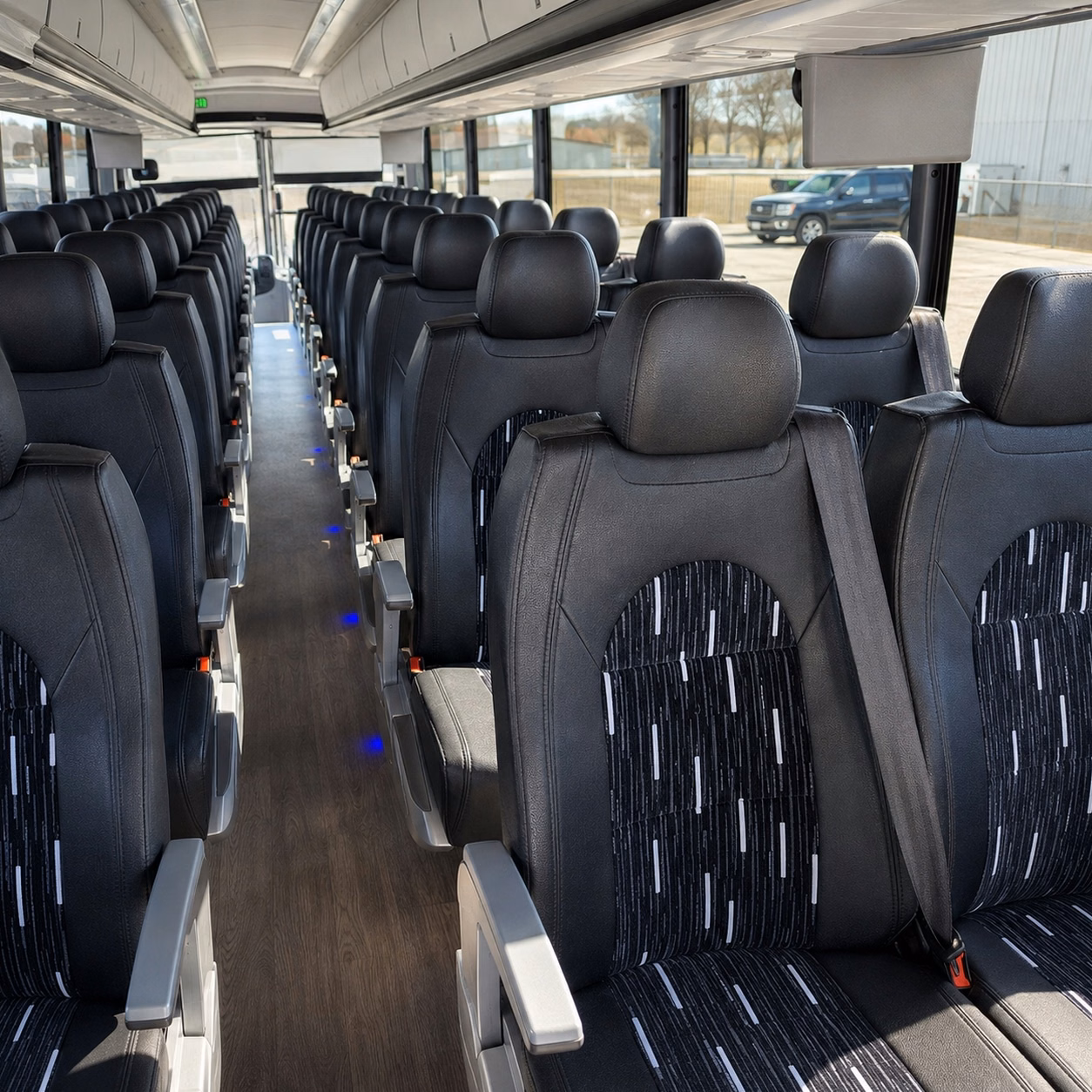 how trip distance and duration affect charter bus rates in manchester